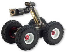 A four-wheeled robotic vehicle with large, rugged tires and an adjustable arm equipped with cameras and lights, designed for inspection or exploration.