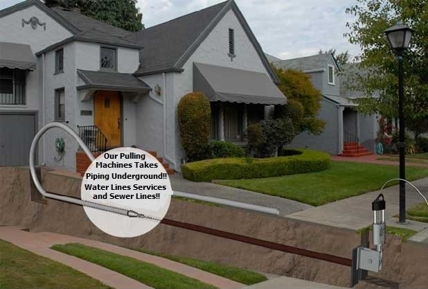 A suburban house with a lawn and curb, showing an illustration of underground pipe installation. A machine pulls a pipe under the sidewalk, with text advertising water and sewer line services.