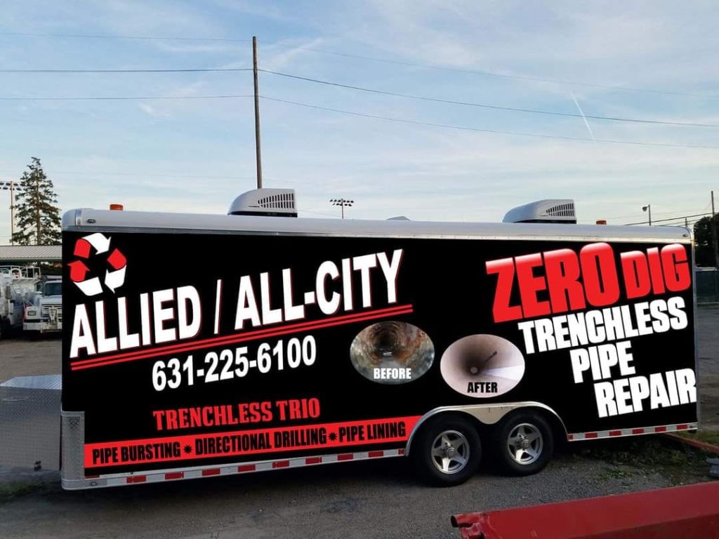 A trailer with "ALLIED / ALL-CITY ZERO DIG TRENCHLESS PIPE REPAIR" written on the side, showing before and after images of a pipe and listing services like pipe bursting, drilling, and pipe lining.